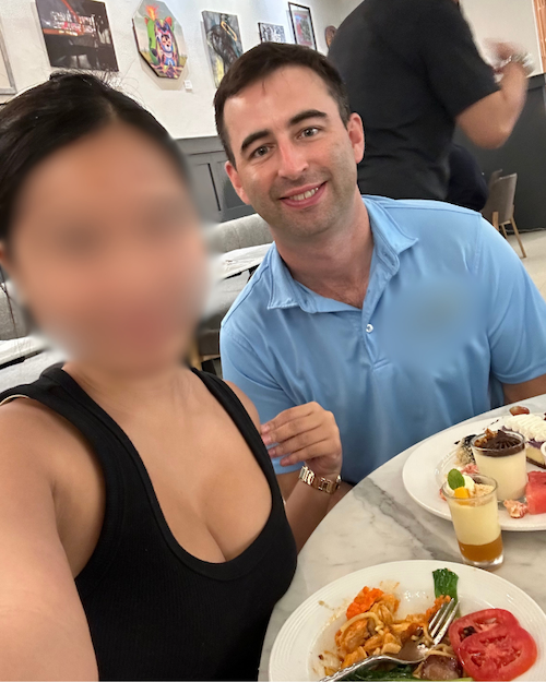 Foreigner having dinner with a Filipina woman he met on FilipinoCupid at a restaurant in Cebu City, Philippines.