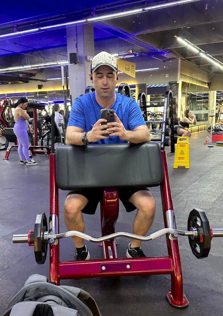 SmartFit gym in Medellin, Colombia. Me working out with pretty Colombian women behind me.