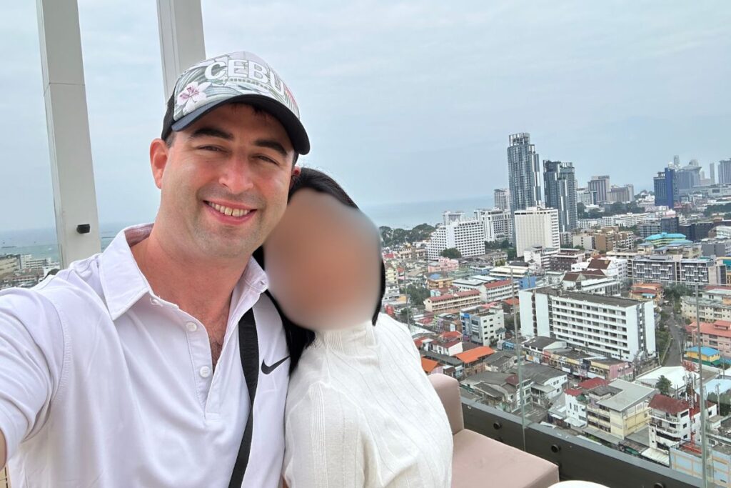 Foreigner with beautiful Thai girlfriend in Pattaya, Thailand.