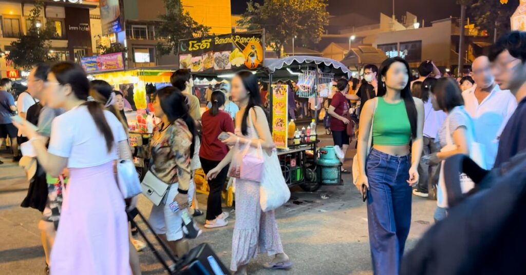 Gorgeous Thai women at a night market in Chiang Mai, Thailand.