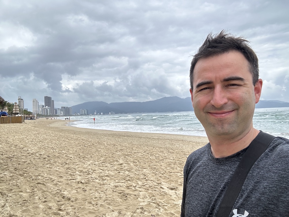 Foreigner hanging out at beautiful My Khe beach in Da Nang, Vietnam