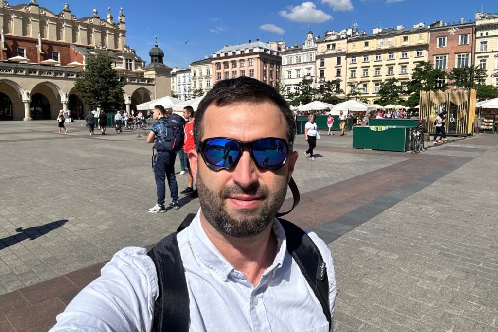 Eric James (me) hanging out in the main square in Krakow, Poland.