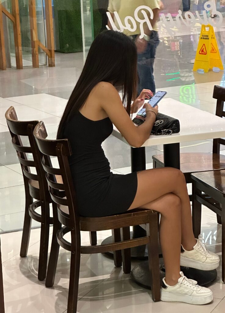 Beautiful foreign women sitting at a coffee shop.