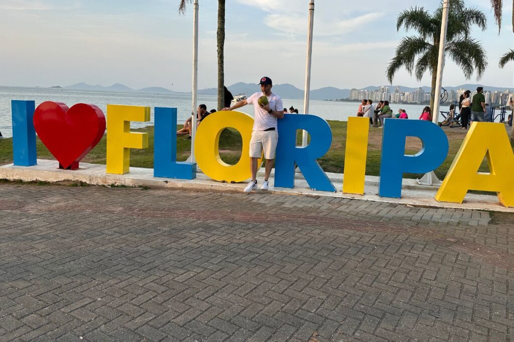 Eric James at the I Love Floripa sign in Florianopolis, Brazil.