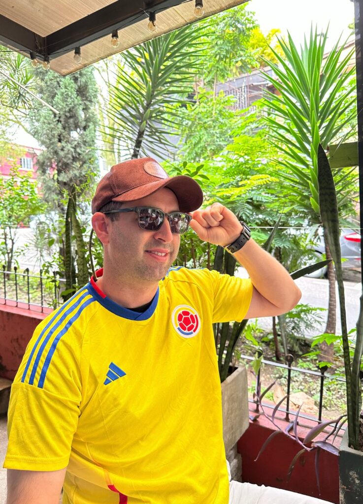 Eric James wearing Colombian futbol jersey in Poblado, Medellin, Colombia.