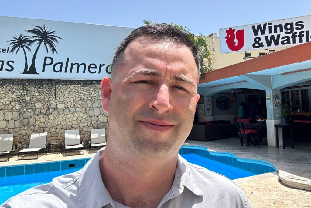 Expat with a new haircut at Las Palmeras hotel and Chicken and Waffle restaurant in Sosua, Dominican Republic.