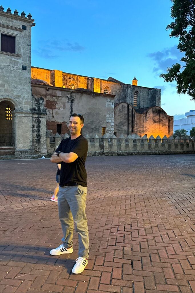 Tourist in Parque Colon in the Zona Colonial in Santo Domingo.
