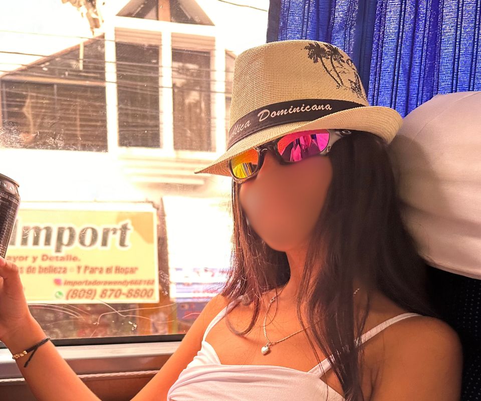 Beautiful woman traveling from Santo Domingo to Punta Cana using the Express Bavaro bus company.