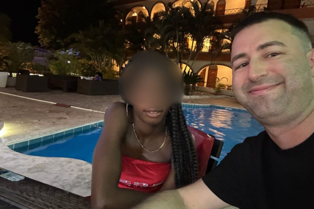 Picture of American expat with Haitian women in Sosua, Dominican Republic.