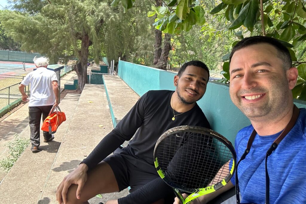 Two tennis players at a tennis club in Santo Domingo before a tennis match.