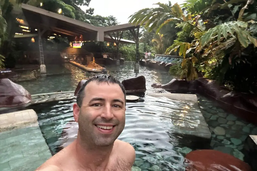 Eric James (me) taking a selfie in a hot spring at Baldi Hot Springs in Costa Rica.