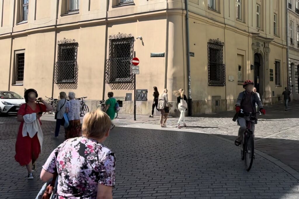 Beautiful polish women walking on the side streets next to Rynek Glowny in Krakow.