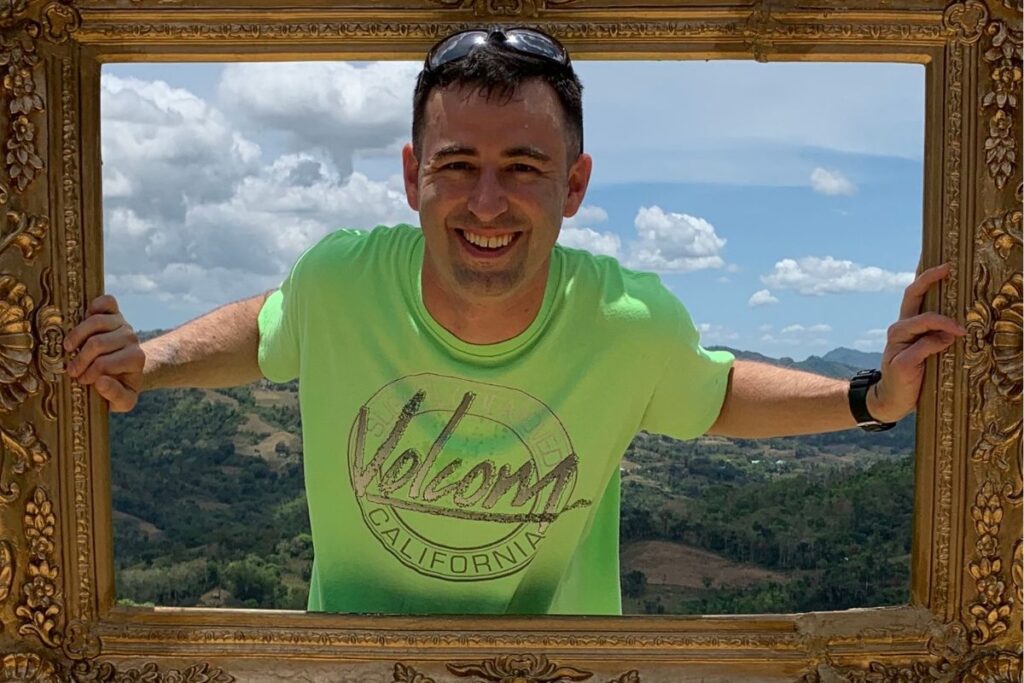 Eric James at the picture frame landmark at Sirao Garden in Cebu, philippines.